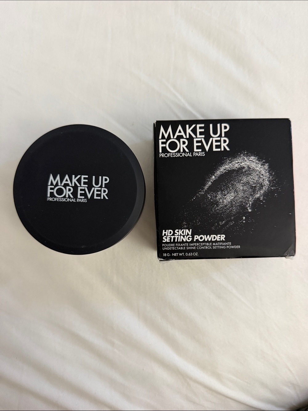 Make Up For Ever HD Skin Setting Powder in shade 0.1 Corrective Rose.